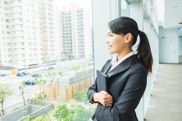 istock Modern business woman in the office with copy space 663353772