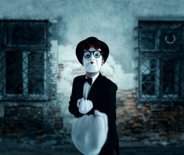 istock Pantomime actor in glasses shows boxer 663383426