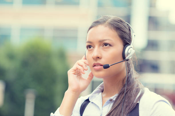 istock business woman, serious customer service representative call centre worker operator 663404082