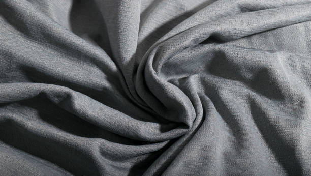 istock Synthetic elegant gray fabric, grey textile background. 663423140