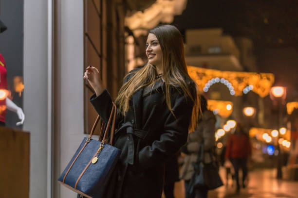 istock Happy shopping woman 663454346