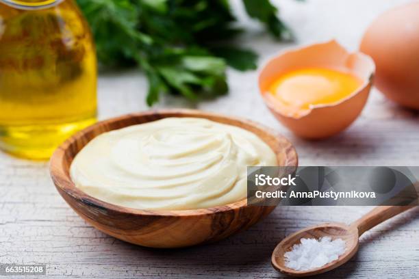 Homemade Mayonnaise Mayo In A Wooden Bowl White Background Stock Photo - Download Image Now