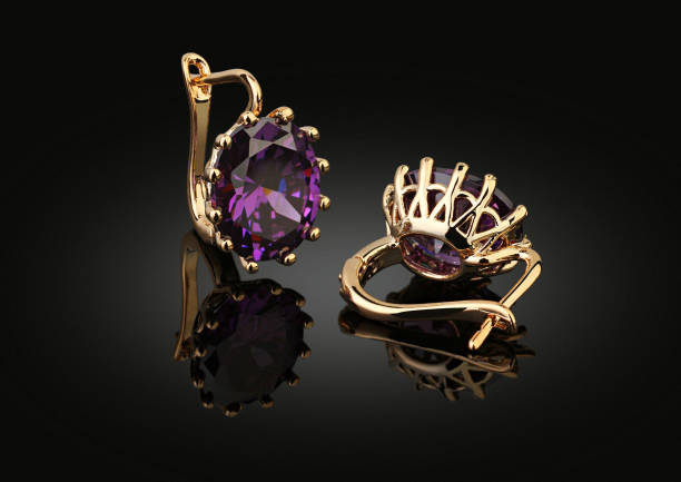 earings dorati su nero con riflessione - jewelry gem gold reflection foto e immagini stock