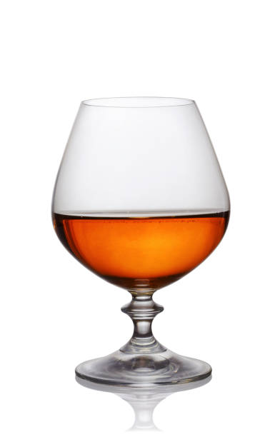 istock Glass of strong alcoholic drink cognac 663532054