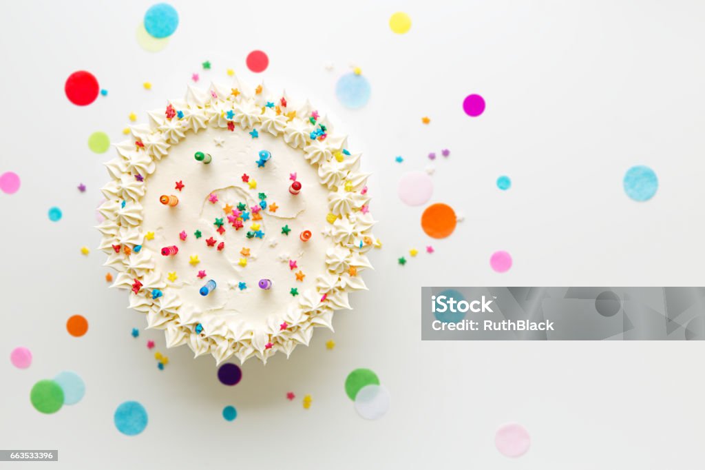 Birthday cake from above Birthday cake with colorful candles High Angle View Stock Photo