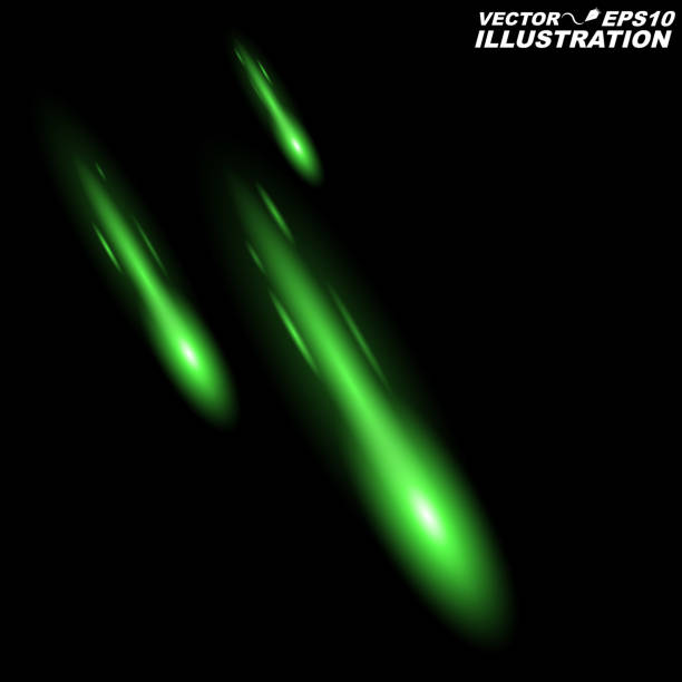 istock Falling meteorites and comets of green color on a dark background. Shining bright light beam. Colorful night scene. Space theme 663541552