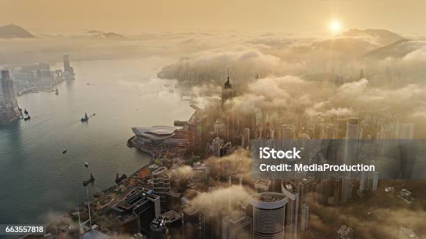 Hong Kong From Air At Sun Rise Stock Photo - Download Image Now - City, Hong Kong, Air Pollution