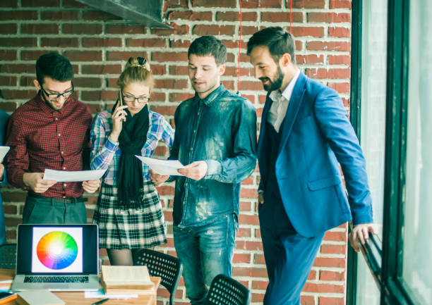 istock business team with documents being prepared to discuss the new a 663577246