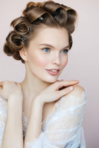 istock Woman in Curlers 663624002
