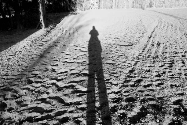 istock shadow of women 663639850