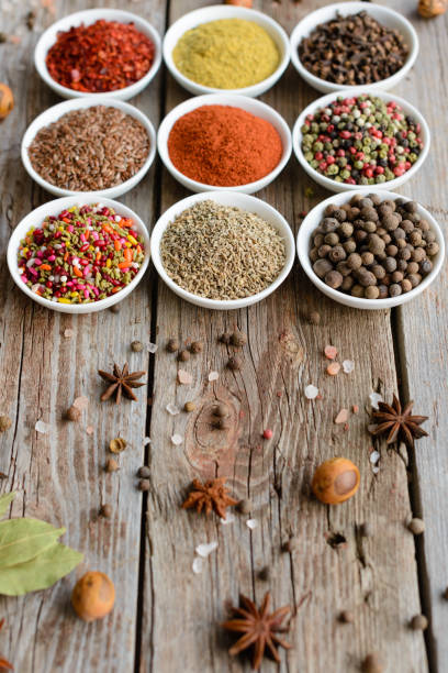 istock Various spices on wooden spoons 663640890