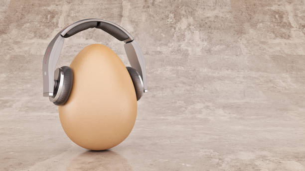 istock Unusual cartoon egg in headphones. 663660632