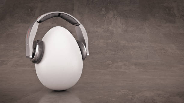 istock Unusual cartoon egg in headphones. 663660876
