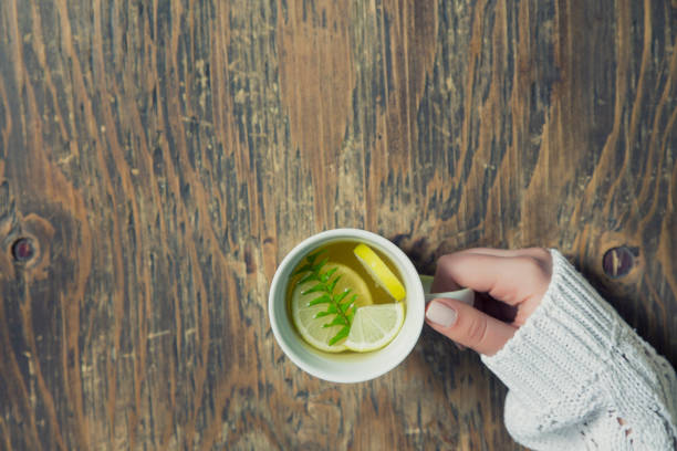 istock Cup of tea with thyme herb and lemon slices 663670630