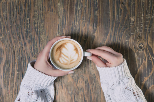 istock Lonely woman drinking coffee in the morning 663671568