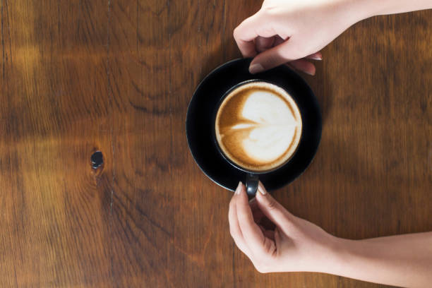 istock Lonely woman drinking coffee in the morning 663671590