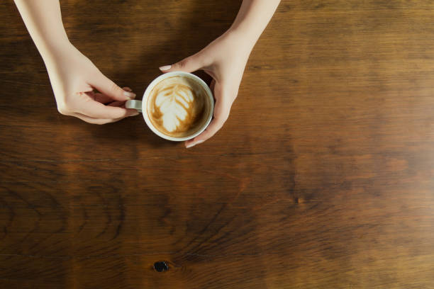 istock Lonely woman drinking coffee in the morning 663671740