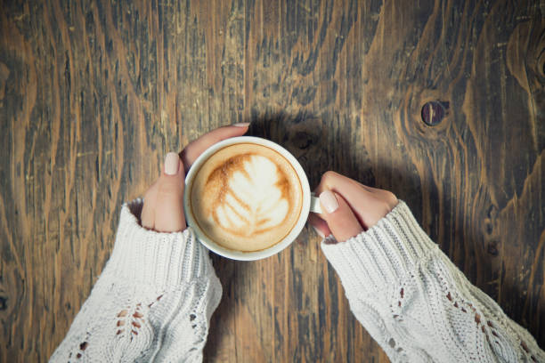 istock Lonely woman drinking coffee in the morning 663671838
