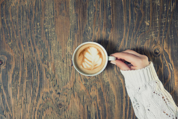 istock Lonely woman drinking coffee in the morning 663671854