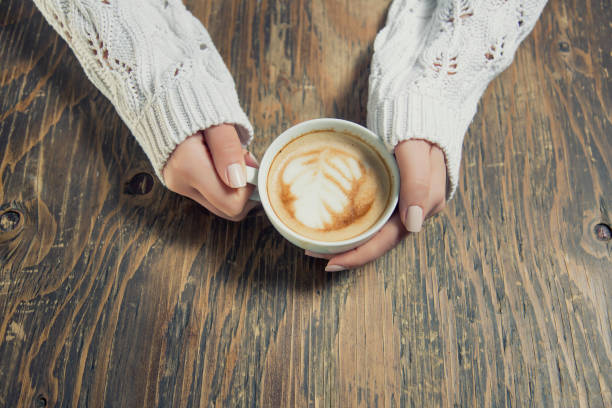 istock Lonely woman drinking coffee in the morning 663671892