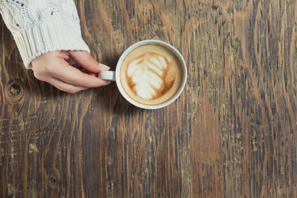 istock Lonely woman drinking coffee in the morning 663671894