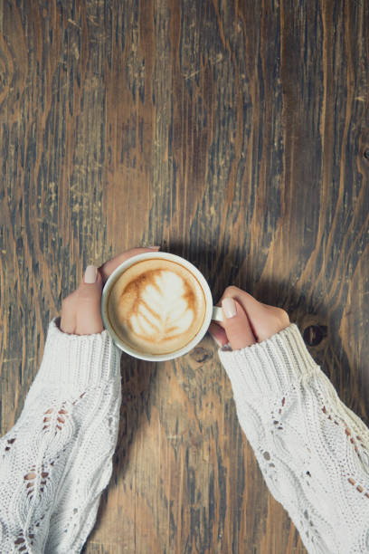 istock Lonely woman drinking coffee in the morning 663671912