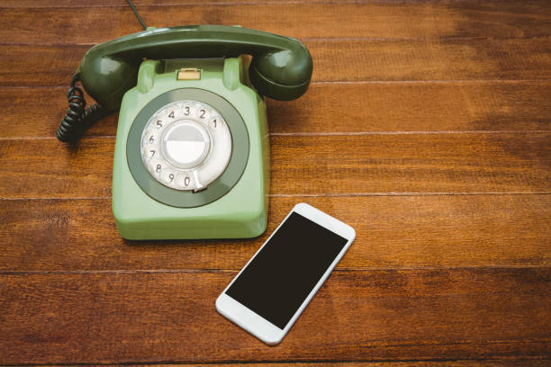 istock View of an old phone and a smartphone 663699882