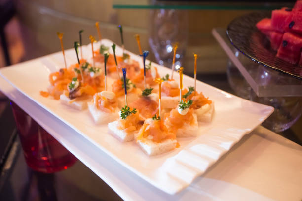 istock Cocktail Food Shrimp Bread Small pieces on the plate 663784284