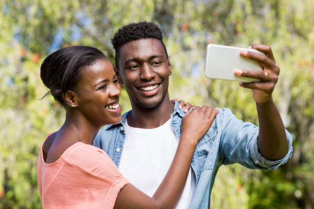 istock Happy family taking a photo 663790962
