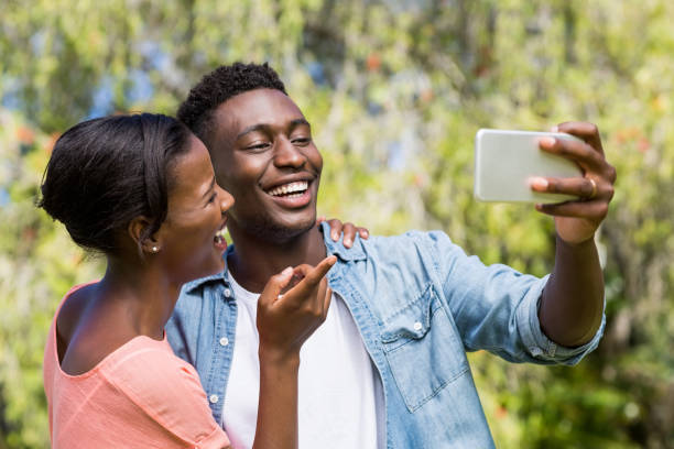 istock Happy family taking a photo 663790988
