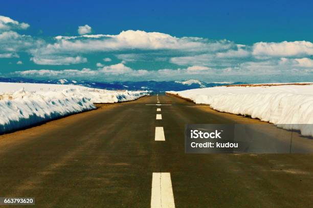 One Road Of Snow Melting Stock Photo - Download Image Now - Cloud - Sky, Horizontal, Japan