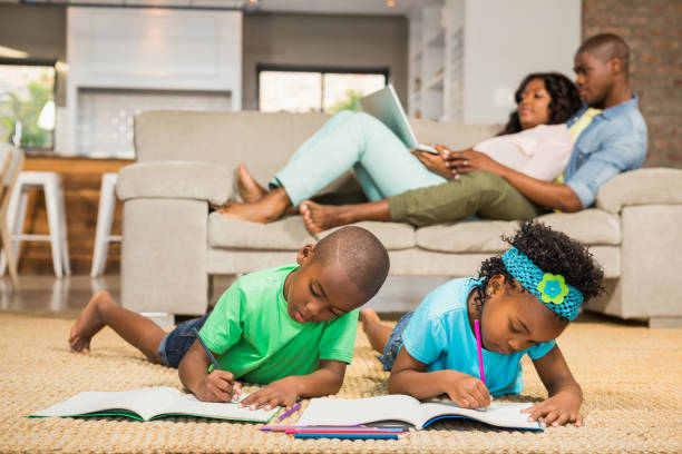 istock Happy siblings on the floor drawing 663799794