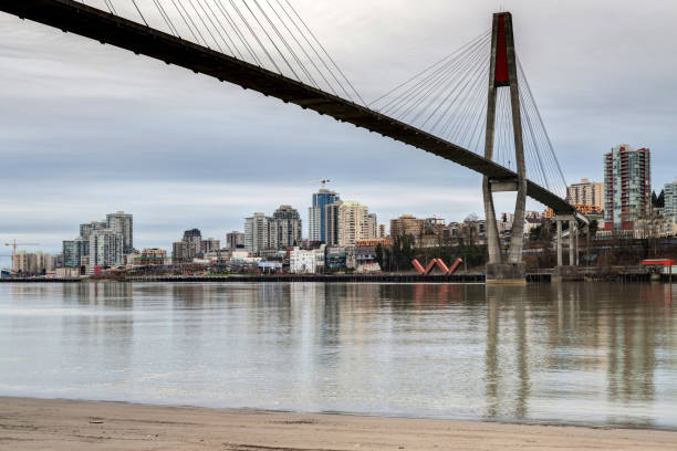 istock skytrain bridge linking Surrey and New Westminster cities in BC, Canada 663800278