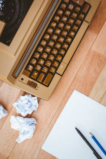 istock View of an old typewriter and paper 663803976