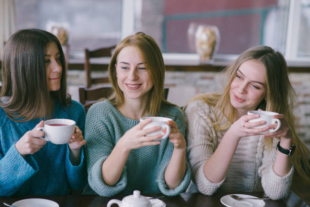 istock girls in cafe 663807024
