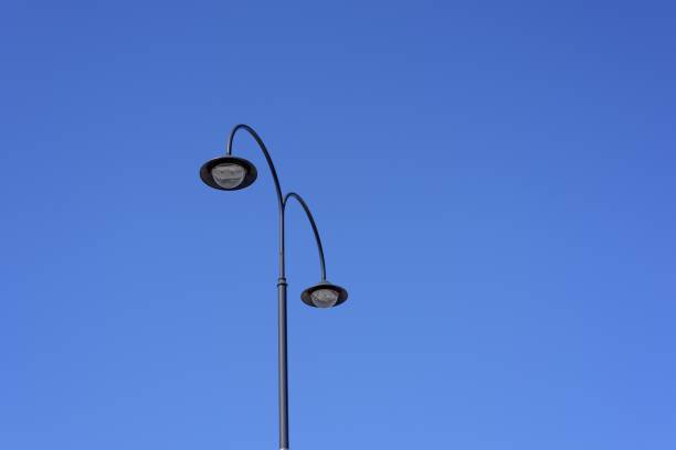 istock Street light on blue sky background, Australia 663820258