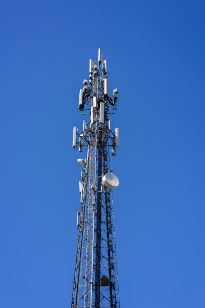 istock mobile phone communication repeater antenna. cell tower. on the blue sky background. 663820266