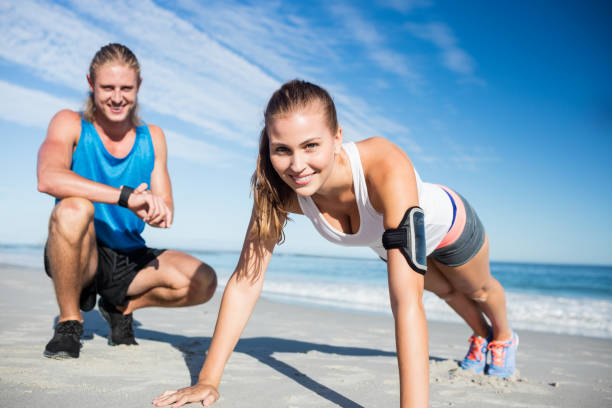 istock Woman holding the plank 663831722