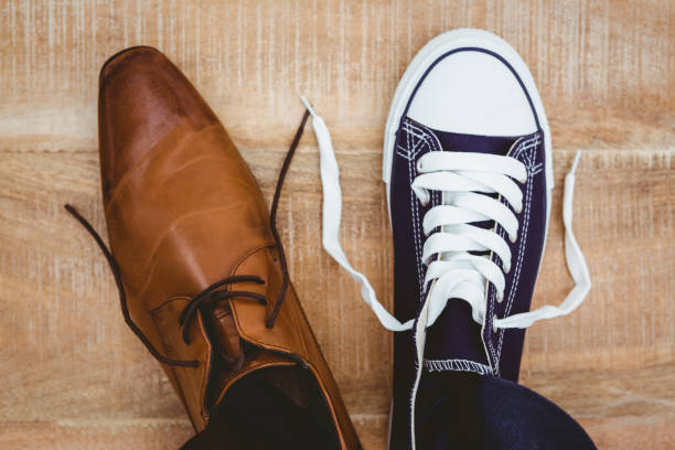 istock View of two different shoes 663834180