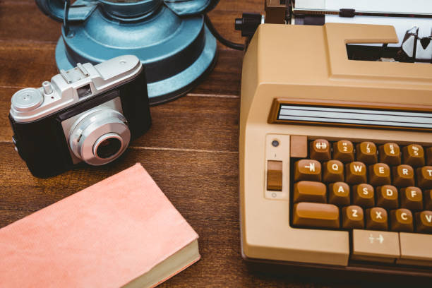istock View of an old typewriter and camera 663837586