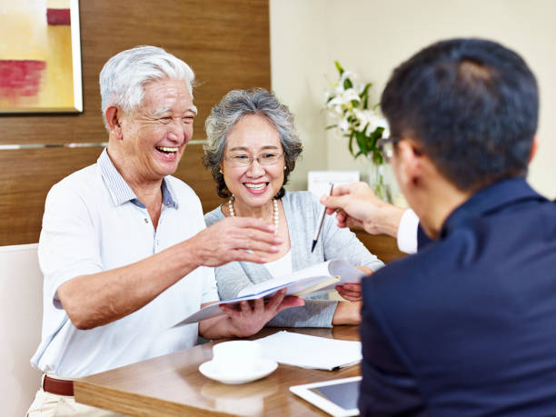 istock senior asian couple ready to sign contract 663845182