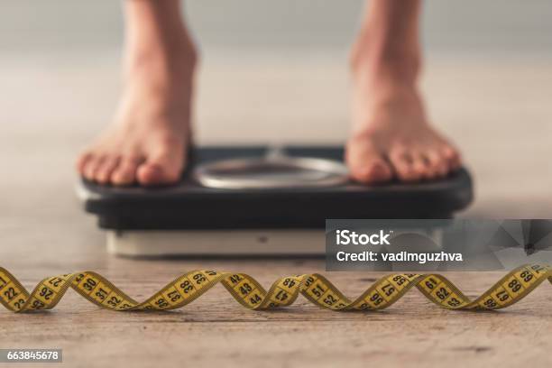 Girl And Weight Loss Stock Photo - Download Image Now - Dieting, Weight Scale, Weight