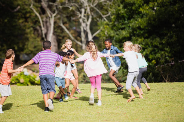 istock Kids playing together during a sunny day 663845930