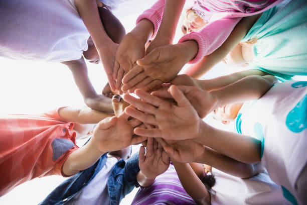 istock Focus on kids hands during a sunny day at camera 663846122