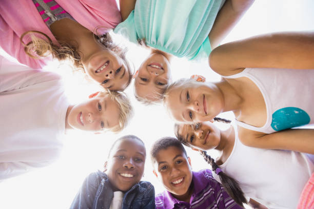 istock Kids posing together during a sunny day at camera 663846436