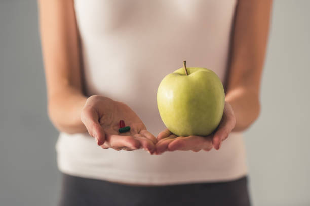 istock Girl keeping diet 663848650