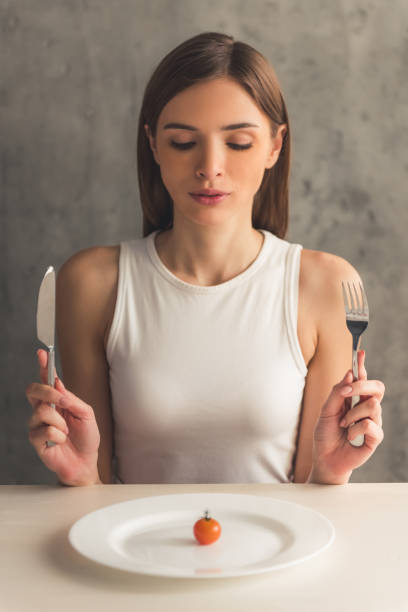 istock Girl keeping diet 663848776
