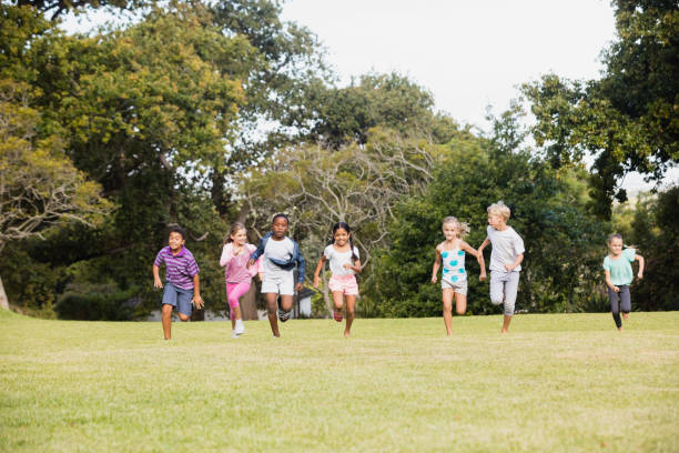 istock Kids playing together during a sunny day 663849226