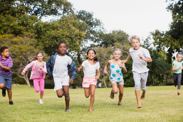 istock Kids playing together during a sunny day 663849340