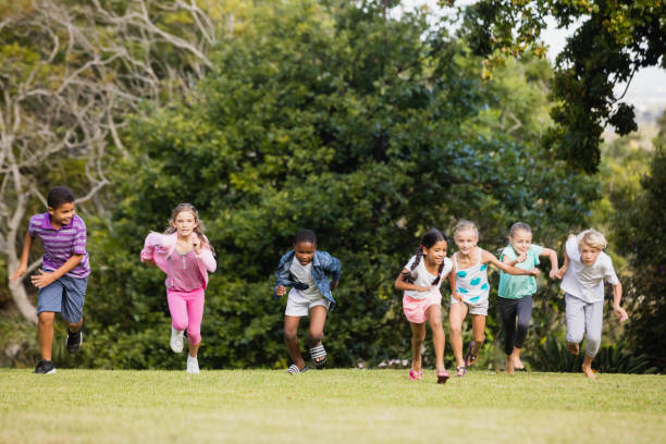 istock Kids playing together during a sunny day 663849532